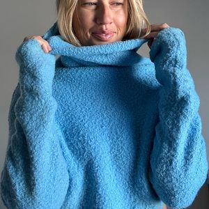 Small blue cropped turtleneck sweater
